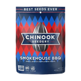 Load image into Gallery viewer, A package of Chinook Sunflower Seeds branded as Smokehouse BBQ flavor. The packaging is predominantly red and blue with an image of a sunflower seed in the center and the text 'Best Seeds Ever' at the top.
