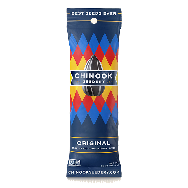 A package of Chinook Sunflower Seeds branded as Smokehouse BBQ flavor. The packaging is predominantly red and blue with an image of a sunflower seed in the center and the text 'Best Seeds Ever' at the top.