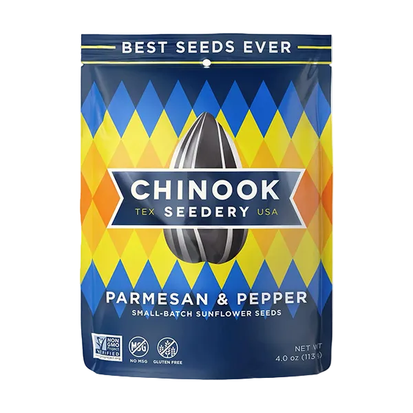 Packaging of Chinook Seedery Parmesan & Pepper sunflower seeds with colorful geometric pattern.